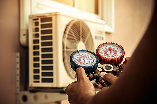 Professional Air Conditioning Service technician working in Helena, MT